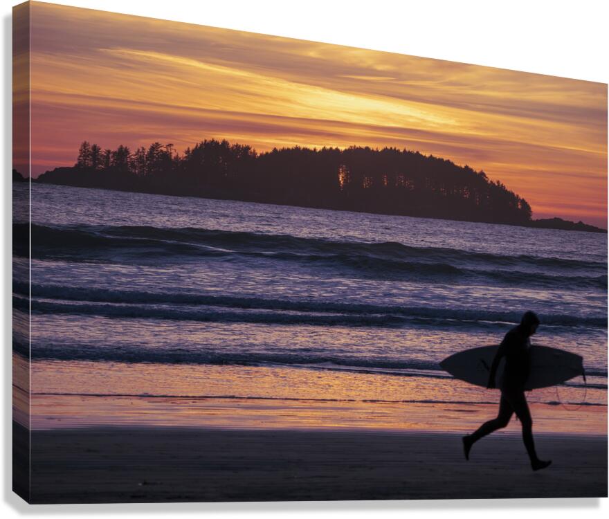 Surfer silhouette against golden sunset sky - beach photography
